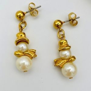 Pearl Snowman Earrings White faux Pearl Snowman Earrings by Avon 1998 Christmas